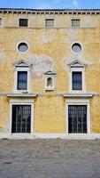 ancient building with windows and doors photo