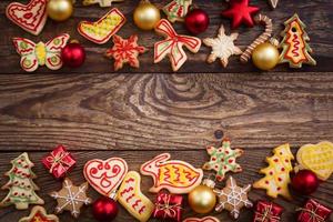 Christmas cookies on brown wooden table. Top view and mock up. Copy space. photo