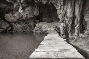 Amazing blue turquoise water and limestone cave sinkhole cenote Mexico. photo