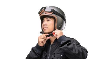 Motorcyclist or rider wearing vintage helmet. Safe ride concept. Studio shot on isolated on white photo