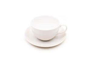 White ceramic cup for coffee or tea isolated on white photo