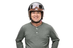 Motorcyclist or rider wearing vintage helmet. Safe ride concept. Studio shot isolated on white photo