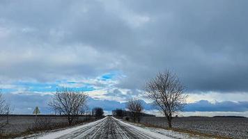 Blue sky with clouds. Road, exit from the occupied territories. War in Ukraine. Escape from the aggressor. photo