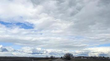 Blue sky with clouds. Road, exit from the occupied territories. War in Ukraine. Escape from the aggressor. photo