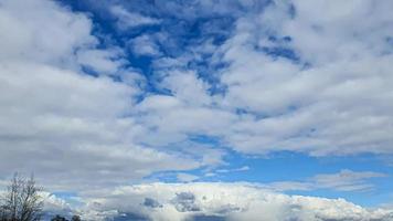Blue sky with clouds. Road, exit from the occupied territories. War in Ukraine. Escape from the aggressor. photo