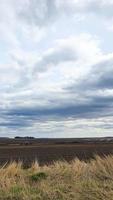 Blue sky with clouds. Road, exit from the occupied territories. War in Ukraine. Escape from the aggressor. photo