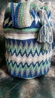 Handmade bags. Knitted from colored threads. Volumetric and comfortable to wear with a long handle. photo