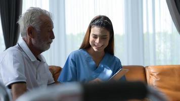 The doctor explains the results of the physical examination and health care program to elderly patients with symptoms of depression. and other complications photo