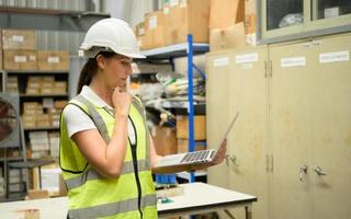 Warehouse Manager, Thinking and reviewing the preparation of products that must be distributed to retailers during the price increase in the market. photo