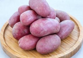 Heap of red potatoes photo