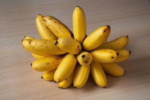 A bunch of banana on the table photo