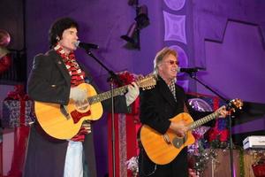 LOS ANGELES, NOV 20 -  Ronn Moss, Peter Beckett, Player at the Hollywood and Highland Tree Lighting Concert 2010 at Hollywood and Highland Center Cour on November 20, 2010 in Los Angeles, CA photo