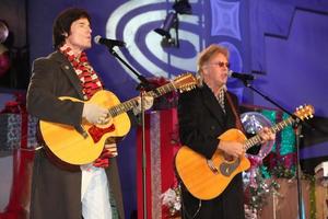 LOS ANGELES, NOV 20 -  Ronn Moss, Peter Beckett, Player at the Hollywood and Highland Tree Lighting Concert 2010 at Hollywood and Highland Center Cour on November 20, 2010 in Los Angeles, CA photo