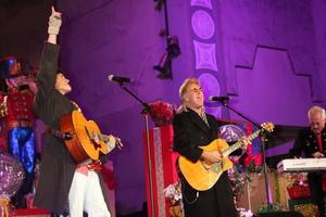 LOS ANGELES, NOV 20 -  Ronn Moss, Peter Beckett, Player at the Hollywood and Highland Tree Lighting Concert 2010 at Hollywood and Highland Center Cour on November 20, 2010 in Los Angeles, CA photo