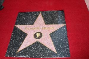 LOS ANGELES, OCT 3 -  Julianne Moore s Star at the Hollywood Walk of Fame Ceremony for Julianne Moore at W Hollywood Hotel on October 3, 2013 in Los Angeles, CA photo