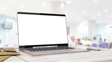 Laptop Mock-Up Empty screen on the service counter with blurred background. photo