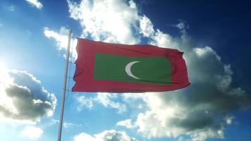 Flag of Maldives waving at wind against beautiful blue sky. 3d rendering photo