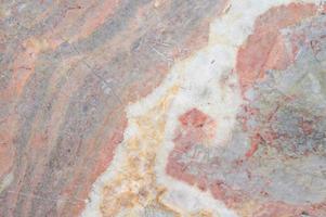 Red, yellow, pink and white marble texture with natural pattern for background. photo