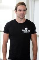 SAN DIEGO, JUL 22 - Dustin Clare at the 2011 Comic-Con Convention, Day 2 at San Diego Convention Center on July 22, 2010 in San DIego, CA photo