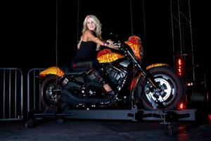 LOS ANGELES, OCT 21 - Gretchen Rossi and the Cosmic Starship Harley at the Harley Davidson Showcase - Unveiling of Cosmic Harley by Artist Jack Armstrong on October 21, 2010 in Marina Del Rey, CA photo