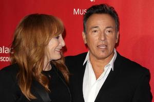 LOS ANGELES, FEB 8 - Patti Scialfa, Bruce Springsteen arrives at the 2013 MusiCares Person Of The Year Gala Honoring Bruce Springsteen on February 8, 2013 in Los Angeles, CA photo