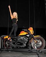 LOS ANGELES, OCT 21 - Gretchen Rossi and the Cosmic Starship Harley at the Harley Davidson Showcase - Unveiling of Cosmic Harley by Artist Jack Armstrong on October 21, 2010 in Marina Del Rey, CA photo