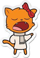 sticker of a cartoon cat in winter clothes vector