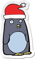 pegatina de un pingüino navideño de dibujos animados vector