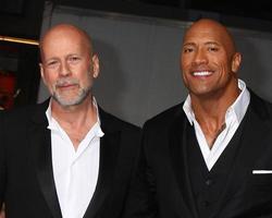 LOS ANGELES, MAR 28 - Bruce Willis, Dwayne Johnson arrives at the G.I. Joe - Retaliation  LA Premiere at the Chinese Theater on March 28, 2013 in Los Angeles, CA photo