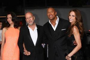 LOS ANGELES, MAR 28 - Emma Heming, Bruce Willis, Dwayne Johnson, Lauren Hashian arrives at the G.I. Joe - Retaliation  LA Premiere at the Chinese Theater on March 28, 2013 in Los Angeles, CA photo