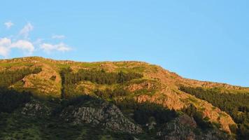 time-lapse of sunset in mountains shaky video