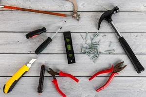 Tools on a wooden background photo
