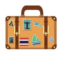 Suitcase decorated with stickers vector