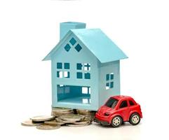 coins stacks and car and house on white background,business saving and investment concept photo