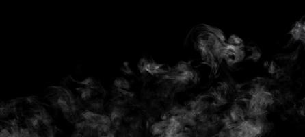 Abstract powder or smoke effect isolated on black background photo