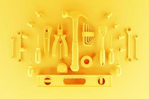 Various  yellow working tools for construction, repair on  monocrome background. photo