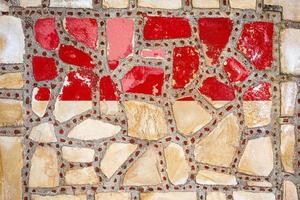 National flag of Indonesia on stone  wall background. Flag  banner on  stone texture background. photo