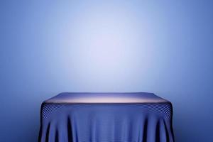 3d illustration of a scene from a square on a pedestal under a blue  cloth  on a monocrome background. photo