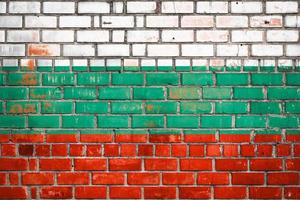 Bulgarian flag on a grunge brick background. photo