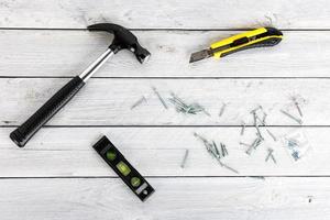 Tools on a wooden background photo