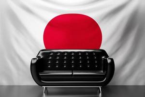 Black leather sofa with the national flag of Japan in the background. 3D illustration photo