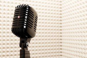 Black  retro microphone isolated on a light background. minimal style. 3d rendering photo