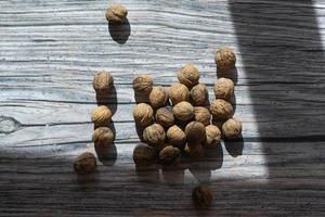 Walnuts on rustic background photo