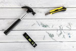 Tools on a wooden background photo