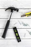 Tools on a wooden background photo