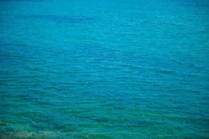 Vivid blue and green ocean photo