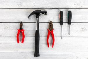 Tools on a wooden background photo