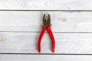 Tools on a wooden background photo