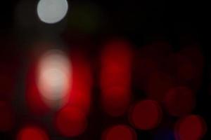 Abstract bokeh light effects on the night. Black background with colorful light effects. background with  Blur bokeh effects. Abstract background texture photo