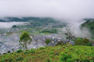 Fog over the mountains.In the rainy weather in the countryside. Filled with green trees and beautiful nature. Free Photo